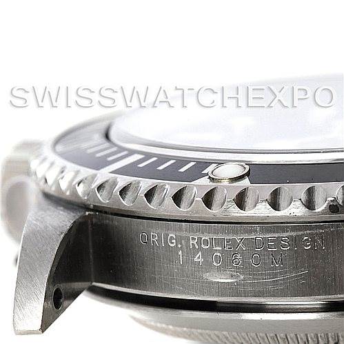 The image shows a close-up of the side of a Rolex Submariner 14060 Men
s Stainless Steel Black Dial 14060 Men
s Stainless Steel Black Dial watch, highlighting the bezel and the engraved model details.