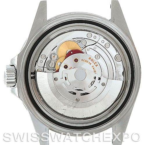 The image shows the case back removed from a Rolex Submariner 14060 Men
s Stainless Steel Black Dial 14060 Men
s Stainless Steel Black Dial, revealing the movement and internal components.