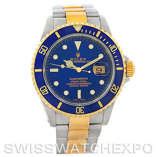 The image shows a Rolex Submariner 16613 Men's Steel and Gold (two tone) Blue Dial 16613 Men's Steel and Gold (two tone) Blue Dial model watch from a front angle, highlighting its blue dial, gold and silver band, and date window.