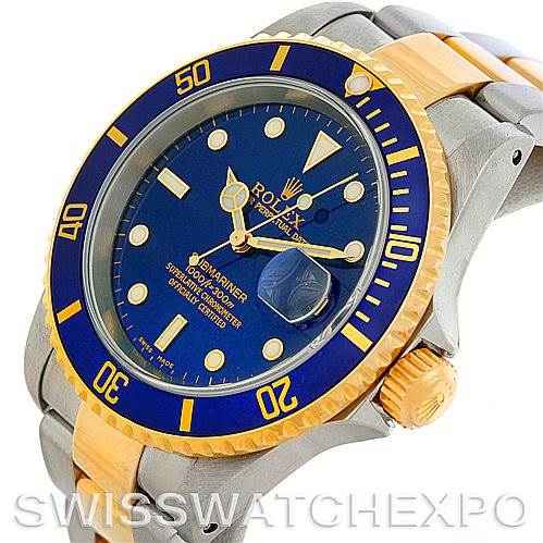 This image shows a Rolex Submariner 16613 Men's Steel and Gold (two tone) Blue Dial 16613 Men's Steel and Gold (two tone) Blue Dial watch angled to display the bezel, dial, crown, and part of the bracelet.
