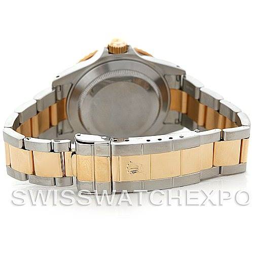 This image shows the back view of the Rolex Submariner 16613 Men's Steel and Gold (two tone) Blue Dial 16613 Men's Steel and Gold (two tone) Blue Dial watch, focusing on the clasp and the case back.