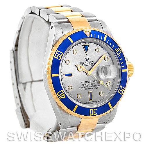 The image shows a Rolex Submariner 16613 Men's Steel and Gold (two tone) Grey Dial 16613 Men's Steel and Gold (two tone) Grey Dial watch angled to display its face, bezel, crown, and part of the bracelet.