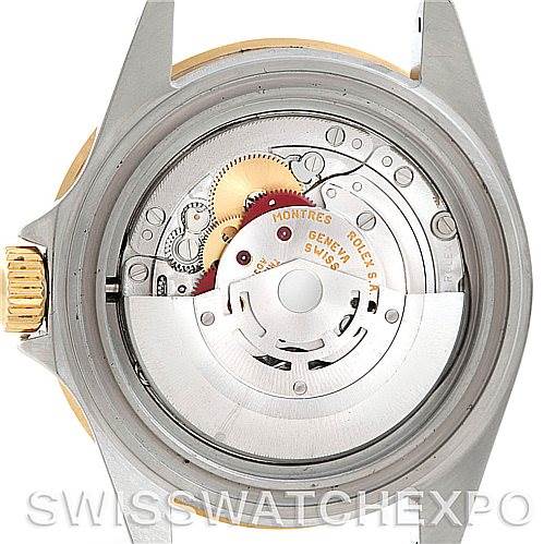 This image shows the back case removed from the Rolex Submariner 16613 Men's Steel and Gold (two tone) Grey Dial 16613 Men's Steel and Gold (two tone) Grey Dial, revealing the internal watch movement and mechanism.