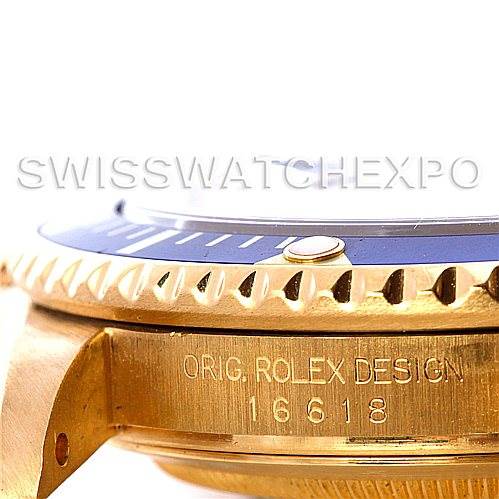 This image shows the side view of the bezel and lugs of a Rolex Submariner 16618 Men's Yellow Gold Champagne Dial 16618 Men's Yellow Gold Champagne Dial, highlighting the engravings.
