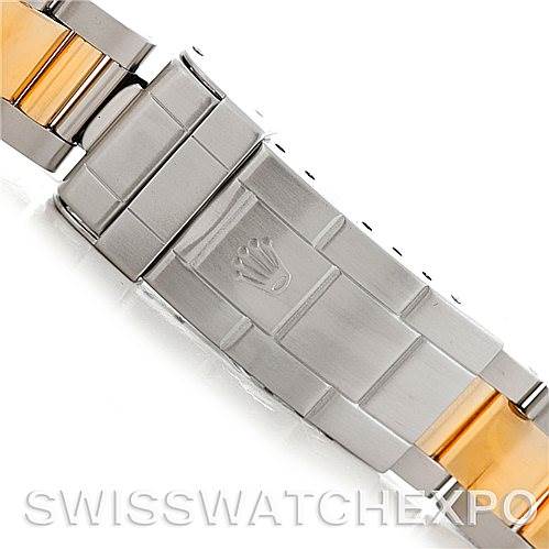 The image shows a close-up of the bracelet and clasp of a Rolex Submariner 16613 Men's Steel and Gold (two tone) Black Dial 16613 Men's Steel and Gold (two tone) Black Dial watch.