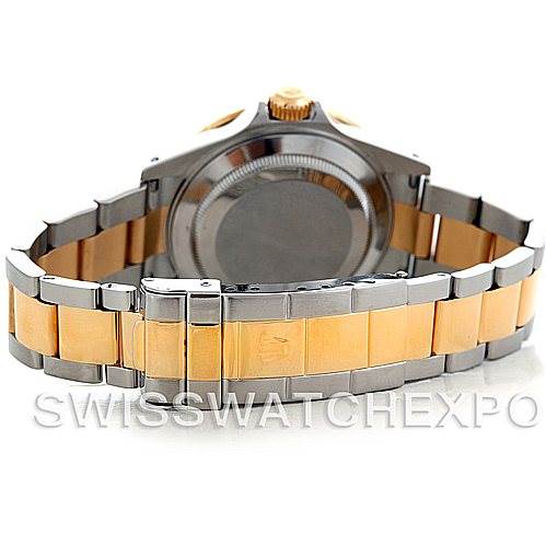 The image shows the back view of a Rolex Submariner 16613 Men's Steel and Gold (two tone) Blue Dial 16613 Men's Steel and Gold (two tone) Blue Dial watch, focusing on the case back and the bracelet.