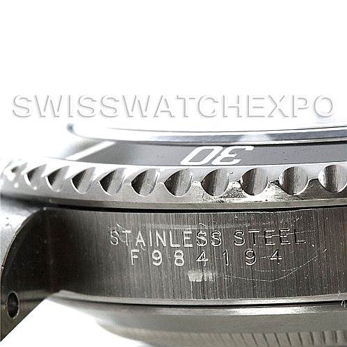 The image shows a close-up side view of the bezel and case with engraving of a Rolex Submariner 14060 Men's Stainless Steel Black Dial 14060 Men's Stainless Steel Black Dial watch.
