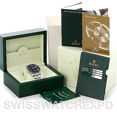 This image shows a Rolex Submariner 116610 Men's Stainless Steel Black Dial 116610 Men's Stainless Steel Black Dial watch, its box, and accompanying documentation and accessories from a front angle.