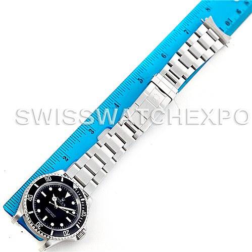 The image shows a horizontal view of a Rolex Submariner 14060 Men's Stainless Steel Black Dial 14060 Men's Stainless Steel Black Dial watch, highlighting its stainless steel bracelet and bezel.