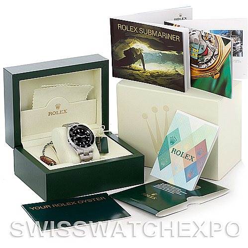 The image shows a Rolex Submariner 16610 Men's Stainless Steel Black Dial 16610 Men's Stainless Steel Black Dial watch in its box, along with booklets and warranty cards.