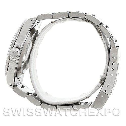 The image shows a side view of the Rolex Submariner 14060 Men's Stainless Steel Black Dial 14060 Men's Stainless Steel Black Dial, displaying the watch case, crown, and bracelet.