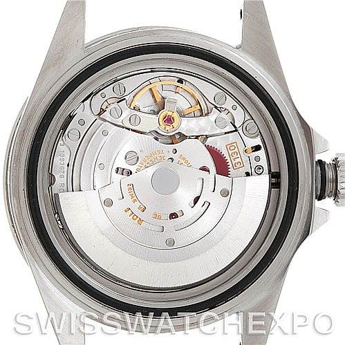 This image shows the back view of a Rolex Submariner 14060 Men's Stainless Steel Black Dial 14060 Men's Stainless Steel Black Dial watch, revealing its internal movement mechanism.