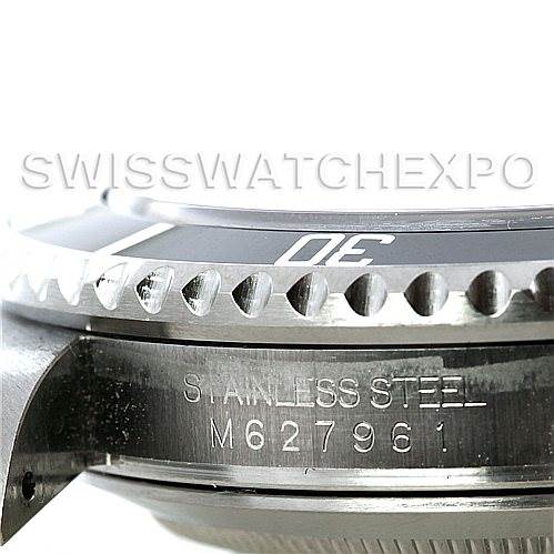 The image shows a detailed side view of the bezel and case of a Rolex Submariner 16610 Men
s Stainless Steel Black Dial 16610 Men
s Stainless Steel Black Dial, highlighting the "Stainless Steel" and model number.