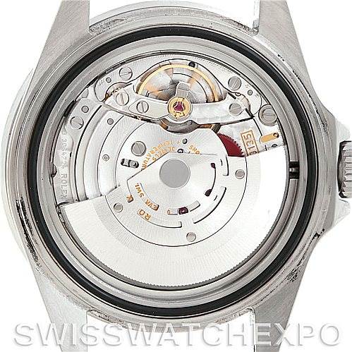 This image shows the back view of a Rolex Submariner 16610 Men
s Stainless Steel Black Dial 16610 Men
s Stainless Steel Black Dial, highlighting its intricate movement and internal mechanics.