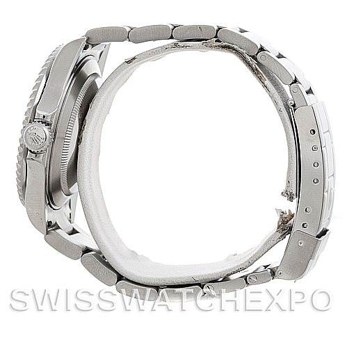 This image shows a side view of the Rolex Submariner 16610 Men
s Stainless Steel Black Dial 16610 Men
s Stainless Steel Black Dial watch, featuring its bracelet, clasp, and crown.