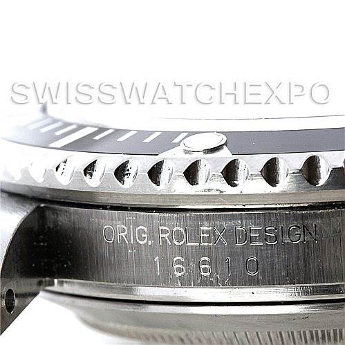 Side angle of the Rolex Submariner 16610 Men
s Stainless Steel Black Dial 16610 Men
s Stainless Steel Black Dial showing the bezel, crown guard, and engraved model number 16610.