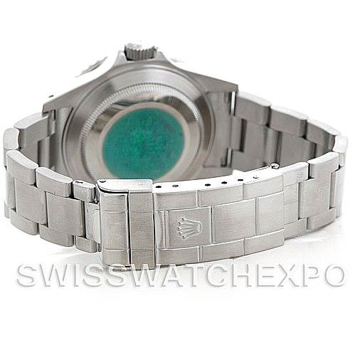 The image shows the back view of a Rolex Submariner 16610 Men
s Stainless Steel Black Dial 16610 Men
s Stainless Steel Black Dial watch, highlighting the case back and the bracelet with the clasp.