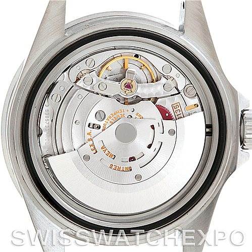 The image shows the back view of a Rolex Submariner 16610 Men
s Stainless Steel Black Dial 16610 Men
s Stainless Steel Black Dial watch, featuring its intricate internal movement mechanism.