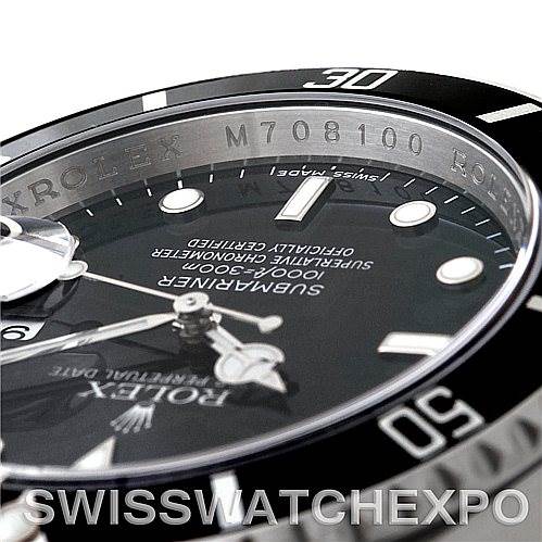 This image shows a close-up angle of the Rolex Submariner 16610 Men
s Stainless Steel Black Dial 16610 Men
s Stainless Steel Black Dial watch, highlighting the dial, bezel, and part of the rehaut.