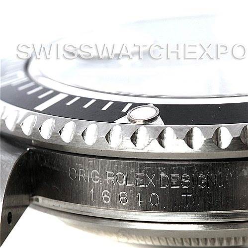 This close-up image shows the bezel and part of the case side of a Rolex Submariner 16610 Men
s Stainless Steel Black Dial 16610 Men
s Stainless Steel Black Dial, model number 16610.