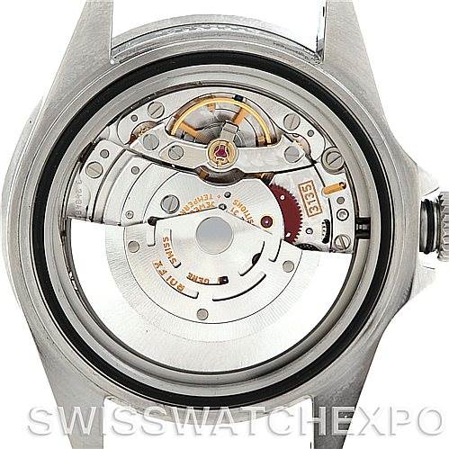 The image shows a close-up view of the movement mechanism of a Rolex Submariner 16610 Men
s Stainless Steel Black Dial 16610 Men
s Stainless Steel Black Dial watch from the back, excluding the case back cover.