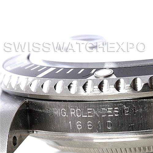 The image shows a close-up, side-angle view of the bezel, crown, and case of a Rolex Submariner 16610 Men
s Stainless Steel Black Dial 16610 Men
s Stainless Steel Black Dial model with the serial number 16610.