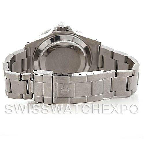 The image shows the back view of a Rolex Submariner 16610 Men
s Stainless Steel Black Dial 16610 Men
s Stainless Steel Black Dial, highlighting the case back and bracelet.