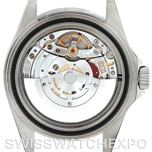 This image shows the back view of the Rolex Submariner 16610 Men
s Stainless Steel Black Dial 16610 Men
s Stainless Steel Black Dial watch, revealing its internal movement and mechanism.