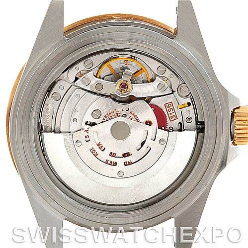 The image shows the back view of a Rolex Submariner 16613 Men
s Steel and Gold (two tone) Black Dial 16613 Men
s Steel and Gold (two tone) Black Dial, displaying its internal movement and mechanisms.