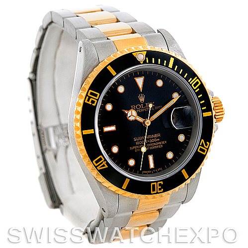 This image shows a Rolex Submariner 16613 Men
s Steel and Gold (two tone) Black Dial 16613 Men
s Steel and Gold (two tone) Black Dial watch at an angled view, highlighting the bezel, dial, and two-tone bracelet.