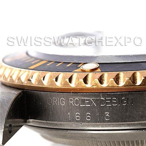 The image shows a close-up side view of the Rolex Submariner 16613 Men
s Steel and Gold (two tone) Black Dial 16613 Men
s Steel and Gold (two tone) Black Dial model, highlighting the bezel, case, and model number 16613 engraving.