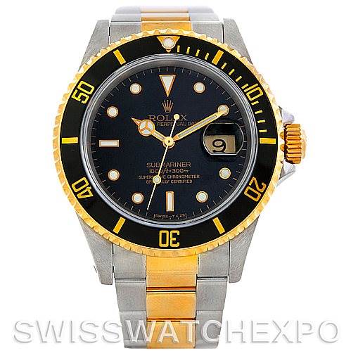 The image shows a front angle of a Rolex Submariner 16613 Men
s Steel and Gold (two tone) Black Dial 16613 Men
s Steel and Gold (two tone) Black Dial watch, highlighting its black dial, two-tone bracelet, and bezel.