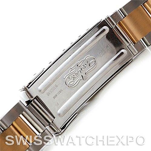 This image shows the clasp and part of the bracelet of a Rolex Submariner 16613 Men's Steel and Gold (two tone) Blue Dial 16613 Men's Steel and Gold (two tone) Blue Dial watch from a close-up angle.