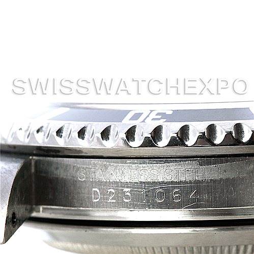 This image shows a side view of a Rolex Submariner 16610 Men
s Stainless Steel Black Dial 16610 Men
s Stainless Steel Black Dial watch, highlighting the stainless steel case with its serial number engraved.