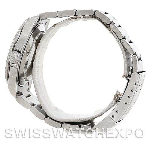 Side profile of a Rolex Submariner 16610 Men
s Stainless Steel Black Dial 16610 Men
s Stainless Steel Black Dial, showing the bracelet, clasp, and part of the watch case.