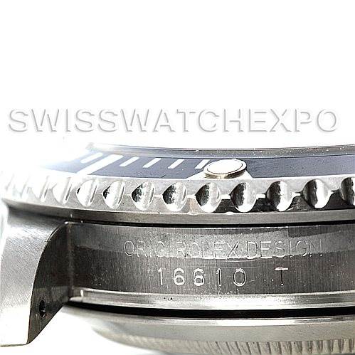 The image shows a close-up side view of a Rolex Submariner 16610 Men
s Stainless Steel Black Dial 16610 Men
s Stainless Steel Black Dial, highlighting the bezel and engraved model number.