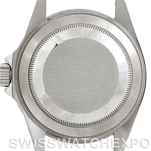 The image shows the back case of a Rolex Submariner 16610 Men
s Stainless Steel Black Dial 16610 Men
s Stainless Steel Black Dial watch from a straight-on angle.