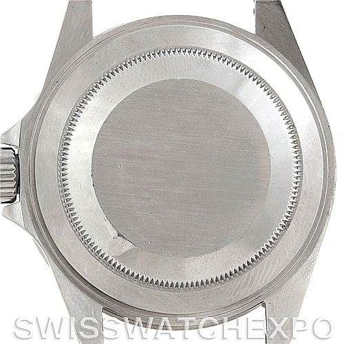 The image shows the case back of a Rolex Submariner 14060 Men
s Stainless Steel Black Dial 14060 Men
s Stainless Steel Black Dial watch from a top-down angle.