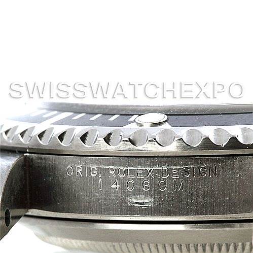 This image shows a close-up side view of the bezel and case of a Rolex Submariner 14060 Men
s Stainless Steel Black Dial 14060 Men
s Stainless Steel Black Dial watch, highlighting the model number "14060M."