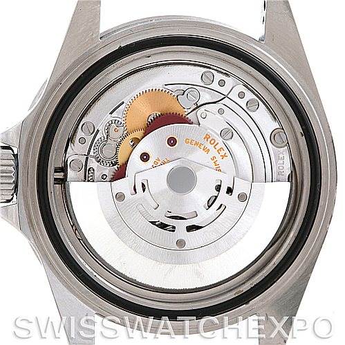 The image shows the movement and internal mechanism of a Rolex Submariner 14060 Men
s Stainless Steel Black Dial 14060 Men
s Stainless Steel Black Dial watch from a top-down angle.