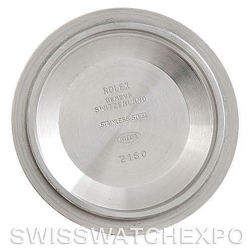 The image shows the inside case back of a Rolex Submariner 14060 Men
s Stainless Steel Black Dial 14060 Men
s Stainless Steel Black Dial watch, displaying engravings about the model and material.