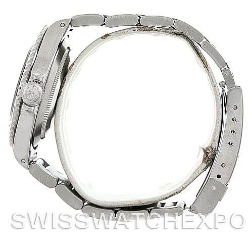 The image shows a side profile view of a Rolex Submariner 14060 Men
s Stainless Steel Black Dial 14060 Men
s Stainless Steel Black Dial watch, focusing on the bracelet and crown.