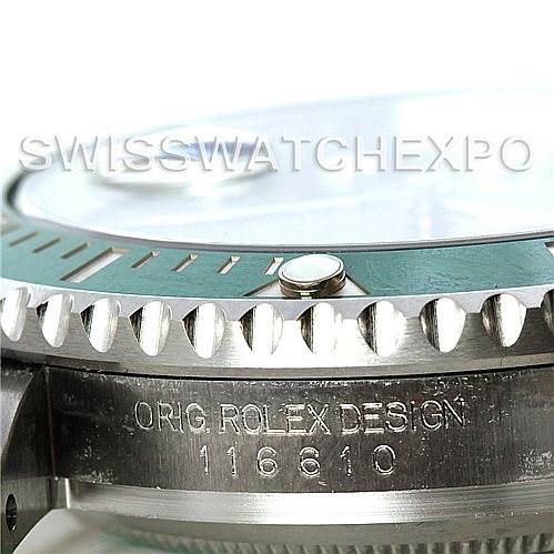 This close-up image of a Rolex Submariner 116610 Men's Stainless Steel Green Dial 116610 Men's Stainless Steel Green Dial watch shows the bezel, crown guard, and part of the case with the model number 116610 engraved.