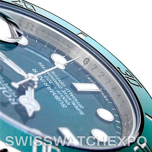 This close-up angle shows the dial, hands, and part of the bezel of a Rolex Submariner 116610 Men's Stainless Steel Green Dial 116610 Men's Stainless Steel Green Dial watch.