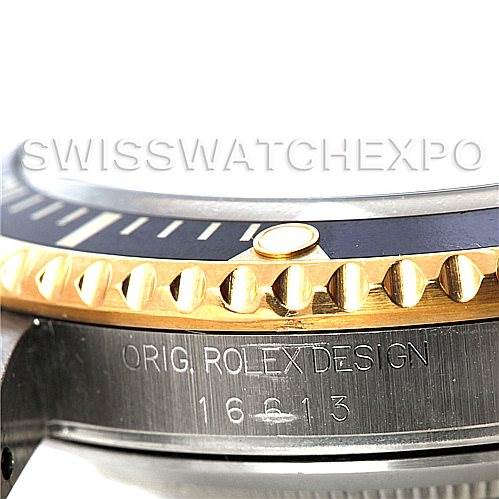The image shows a close-up of the side profile of a Rolex Submariner 16613 Men's Steel and Gold (two tone) Black Dial 16613 Men's Steel and Gold (two tone) Black Dial, featuring the bezel, case, and model engraving.