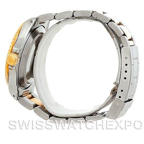 This image shows a side view of a Rolex Submariner 16613 Men's Steel and Gold (two tone) Black Dial 16613 Men's Steel and Gold (two tone) Black Dial watch, highlighting the bracelet and the crown.