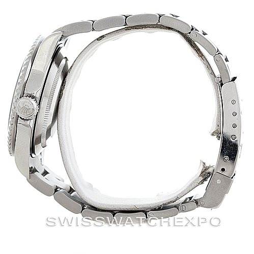 This side view shows the casing and metal bracelet of a Rolex Submariner 16610LV Men
s Stainless Steel Black Dial 16610LV Men
s Stainless Steel Black Dial watch.