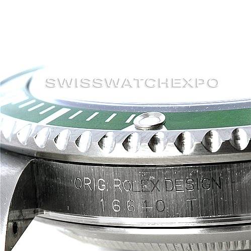 This image shows a close-up angle of the bezel and side case of a Rolex Submariner 16610LV Men
s Stainless Steel Black Dial 16610LV Men
s Stainless Steel Black Dial watch with engraving visible.
