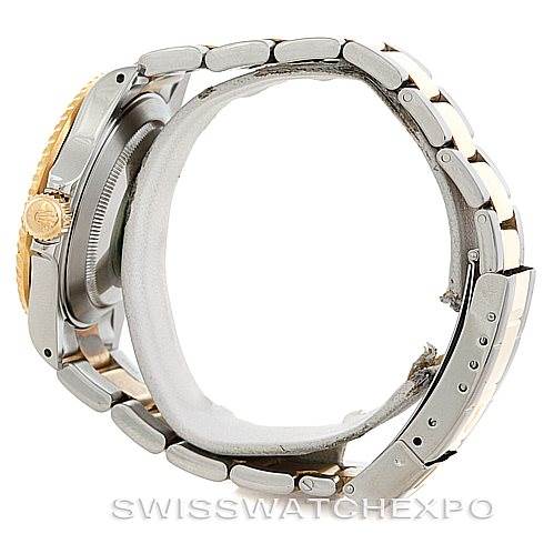 This image shows a side view of a Rolex Submariner 16613 Men's Steel and Gold (two tone) Blue Dial 16613 Men's Steel and Gold (two tone) Blue Dial watch, highlighting the bracelet, case, and crown.