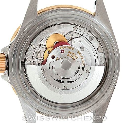 This image displays the back view of a Rolex Submariner 16613 Men's Steel and Gold (two tone) Blue Dial 16613 Men's Steel and Gold (two tone) Blue Dial watch, showcasing its internal mechanical movement parts.